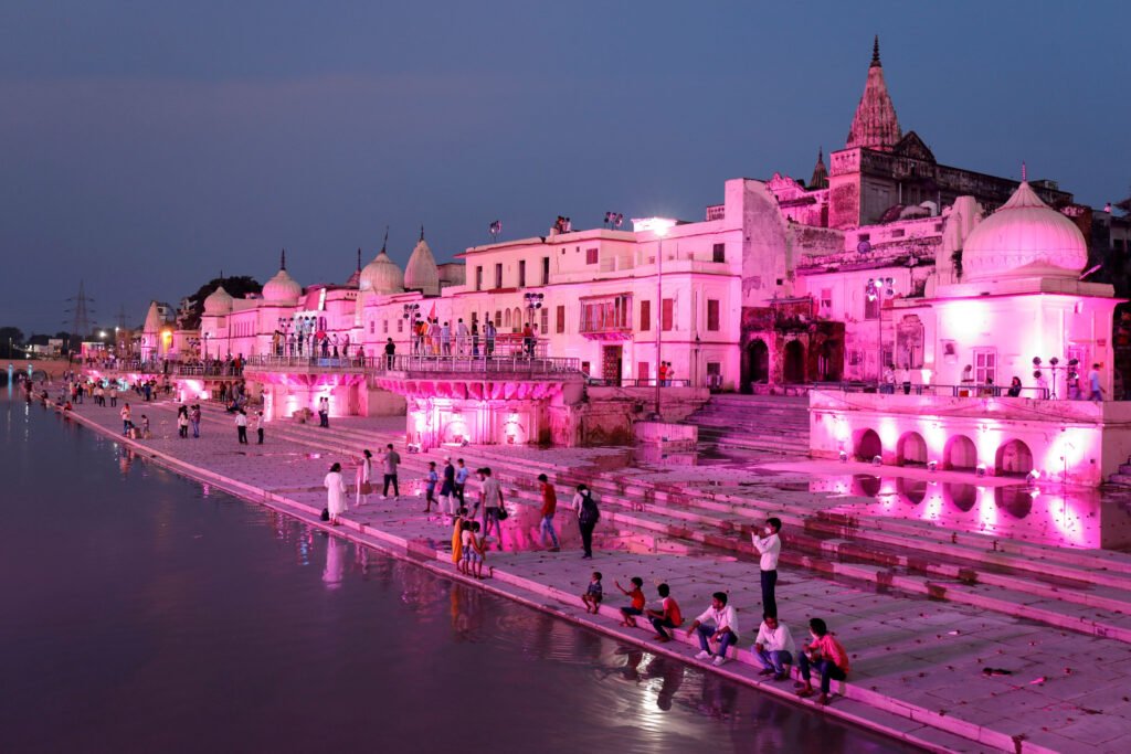 Temples and other buildings on the bank of Sarayu river are seen illuminated ahead of the foundation-laying ceremony for a Hindu temple in Ayodhya
