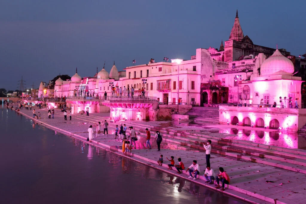 Temples and other buildings on the bank of Sarayu river are seen illuminated ahead of the foundation-laying ceremony for a Hindu temple in Ayodhya