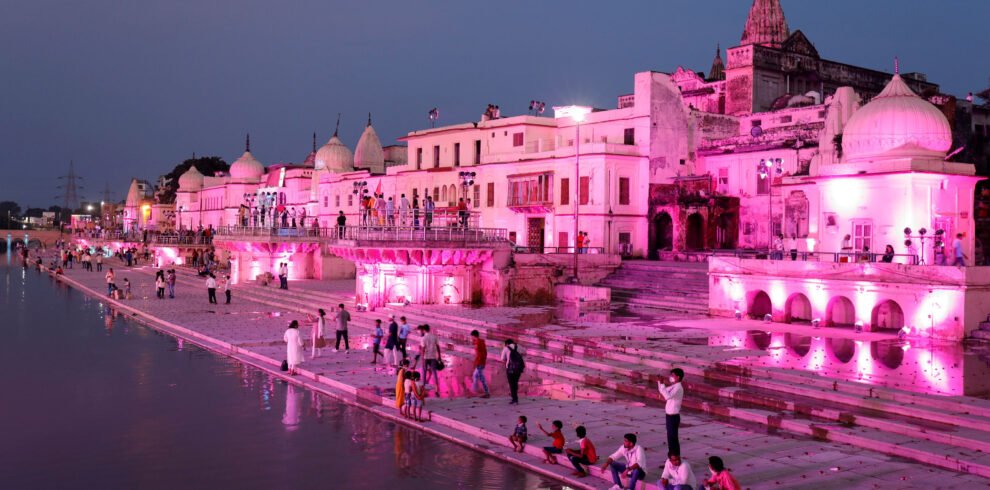 Temples and other buildings on the bank of Sarayu river are seen illuminated ahead of the foundation-laying ceremony for a Hindu temple in Ayodhya